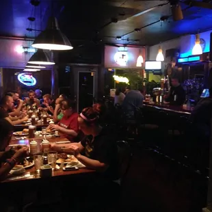 Front dining area includes the full service bar and two flat screen televisions.