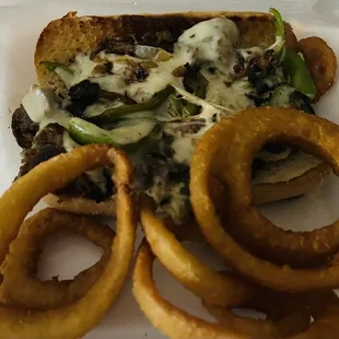 Philly Cheesesteak Sandwich and Onion Rings. Both were worth the order! Really good!