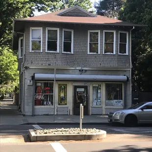 a car parked in front of the store