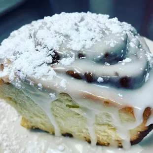 a pastry covered in powdered sugar