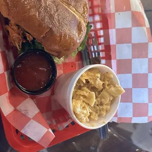 Roost burger with mac &amp; cheese, and a side of pimento cheese.