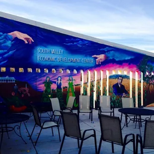 Beautiful mural and patio as you walk in