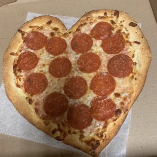 Valentine&apos;s Day heart shape pizza