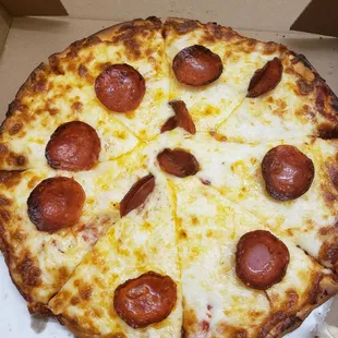 a pepperoni pizza in a box