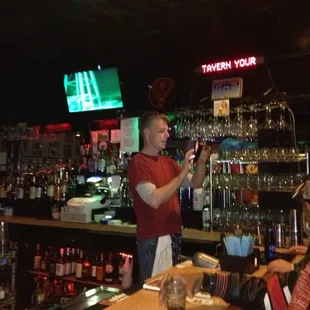a bartender at the bar