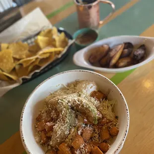 Plantains &amp; Bowl with fried avocado, sweet potato, corn, Crema, rice &amp; black beans.