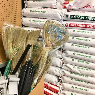 bags of rice and brooms