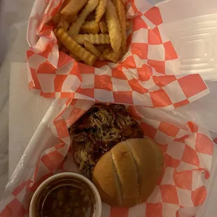 BBQ Pulled pork plate,  delicious tender tasty bbq, the fries has a great seasoning to them, the baked beans fabulous.