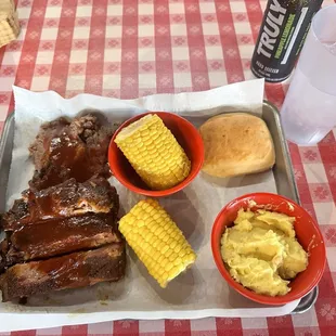 2 meat combo brisket and ribs with corn on the cob and mustard potato salad sides