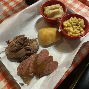 Brisket, jalapeño cheddar sausage, loaded mashed potatoes, Mac and cheese