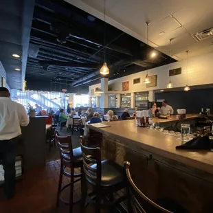 people sitting at the bar