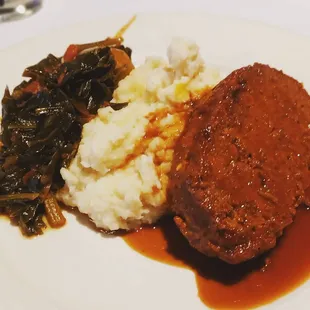 Meatloaf, mashed potatoes and collard greens