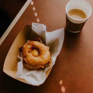 a donut and a cup of coffee
