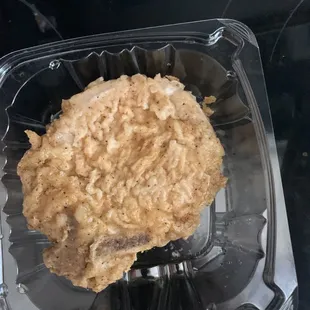 Under cooked and salty pork-chop.