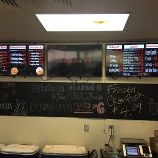 menus on the wall of a restaurant