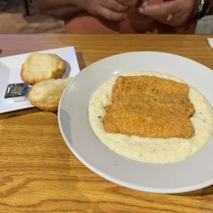 This was our fried salmon and grits with a homemade biscuit yummy