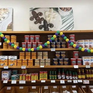 One of their walls filed with yummy Creole coffee and boxed goods!