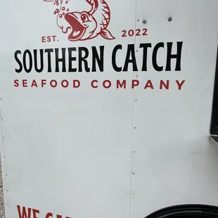 the logo on the side of the trailer