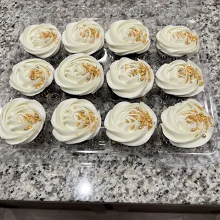 a tray of cupcakes