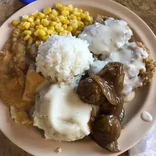 Chicken fried steak, corn, mashed potatoes, king ranch chicken, white rice and meatballs.