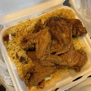 an open takeout container of food