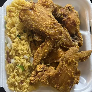 chicken and rice in a styrofoam container