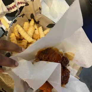 Rajun Cajun, and Spicy Bourbon wigs all flats with Crinkle Fries No Seasoning