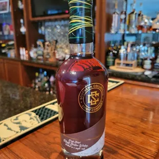 a bottle on a bar