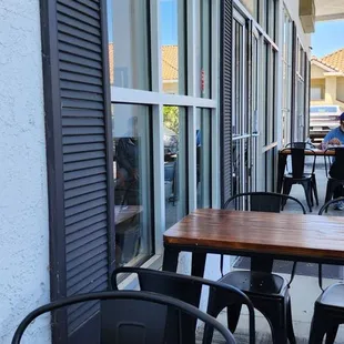 Eating outside next to parked cars