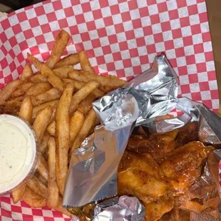 Spicy Garlic wings and fries