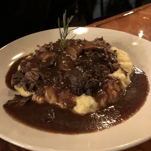 Short ribs off the bone over Yukon mashed potatoes