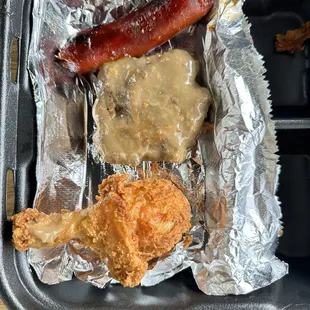 Hot link, fried chicken, smothered chop steak