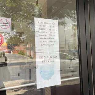 a sign on the door of a restaurant