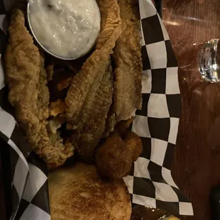 Fried catfish...yum. I wish the fries weren&apos;t hidden on the bottom. They got soggy and I couldn&apos;t eat them.