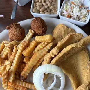 2 piece catfish filet dinner. Cooked perfectly. Love this place. Waite staff were fast and attentive.