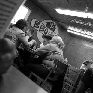 a group of people sitting at a table