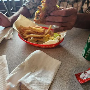 Cheese burgers and fries.