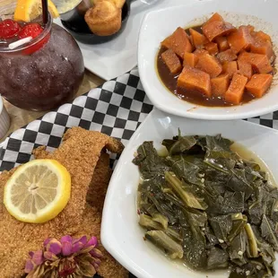 Greens, fried fish, sweet potatoes, down south drink and cornbread.