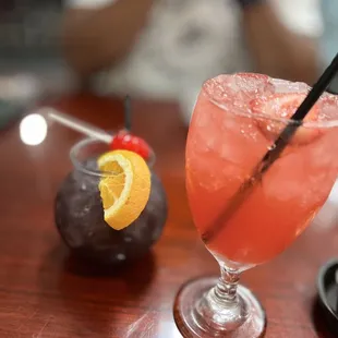 a drink with a garnish