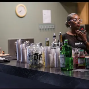 a woman sitting at a bar