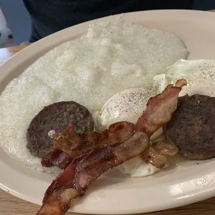 bacon, eggs, and sausage on a plate
