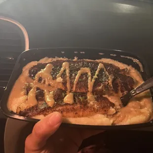 Grits Base, Cajun sauce, baked fish