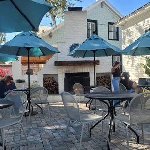 Outdoor seating with fireplace.