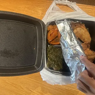 Showing the sides sweet potato's( Candied Yams) and Greens