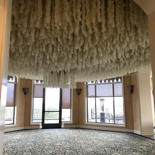 Up close of the floral ceiling decor.