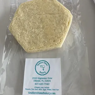 a sandwich wrapped in plastic wrap