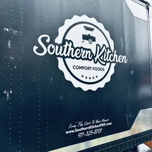 the logo on the side of the truck