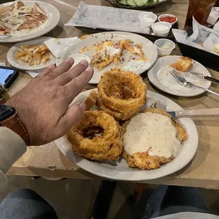 Chicken Fried Steak with onion rings.