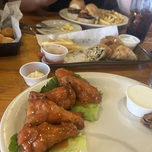 Chicken wings(no sides included) , sliders w/ fries,  appetizers sampler