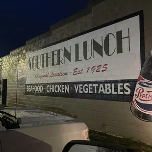 a sign on the side of a building